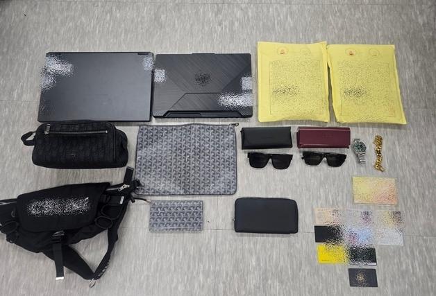 캄보디아발 사기 피의자들, 고급빌라서 금팔찌·명품가방 호의호식 