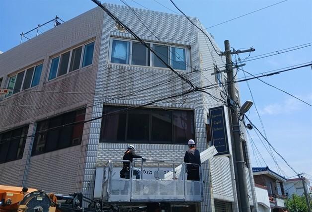 제주시 "주인 없는 노후 간판, 무료로 철거해 드려요"