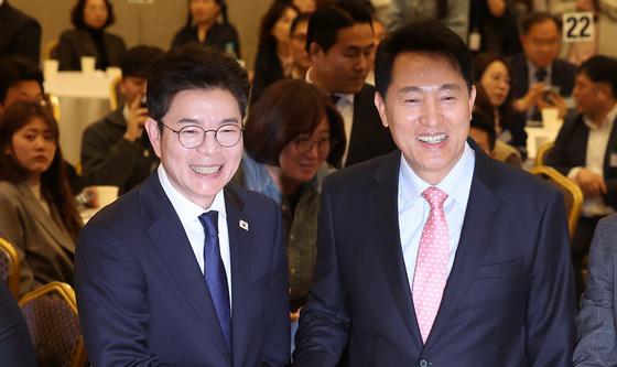 악수하는 오세훈·정원오